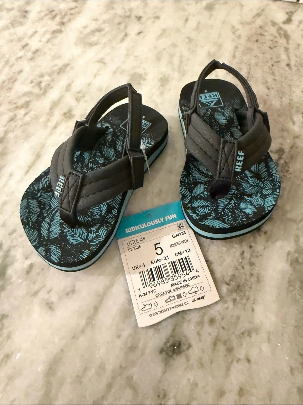 Reef Kids Black and Blue Leaf Print Flip Flops